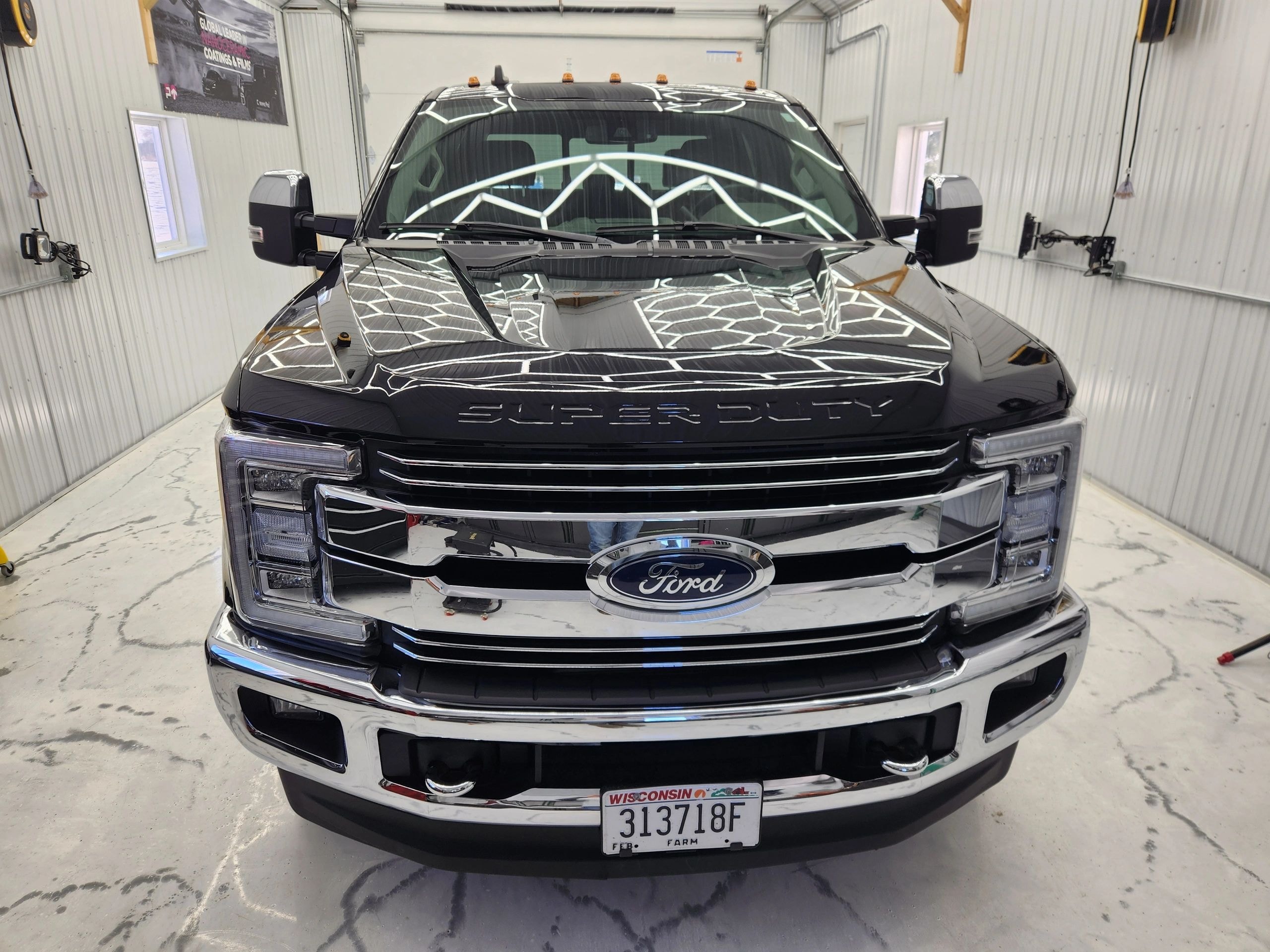 Ceramic Pro coating on black Ford Super Duty truck — VR Restoration Marathon WI