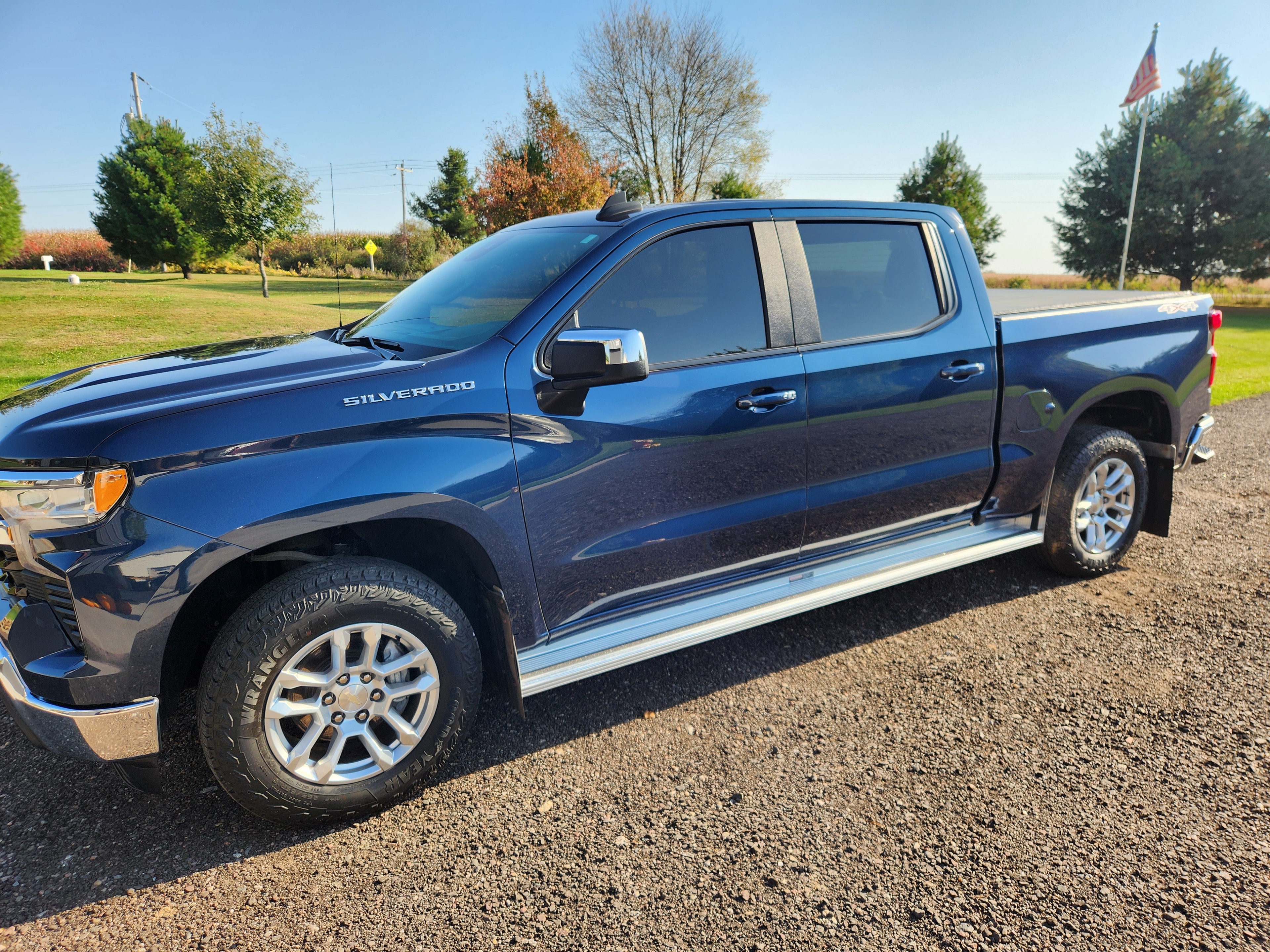 20% window tint on blue Chevrolet Silverado crew cab pickup truck — VR Restoration Marathon WI