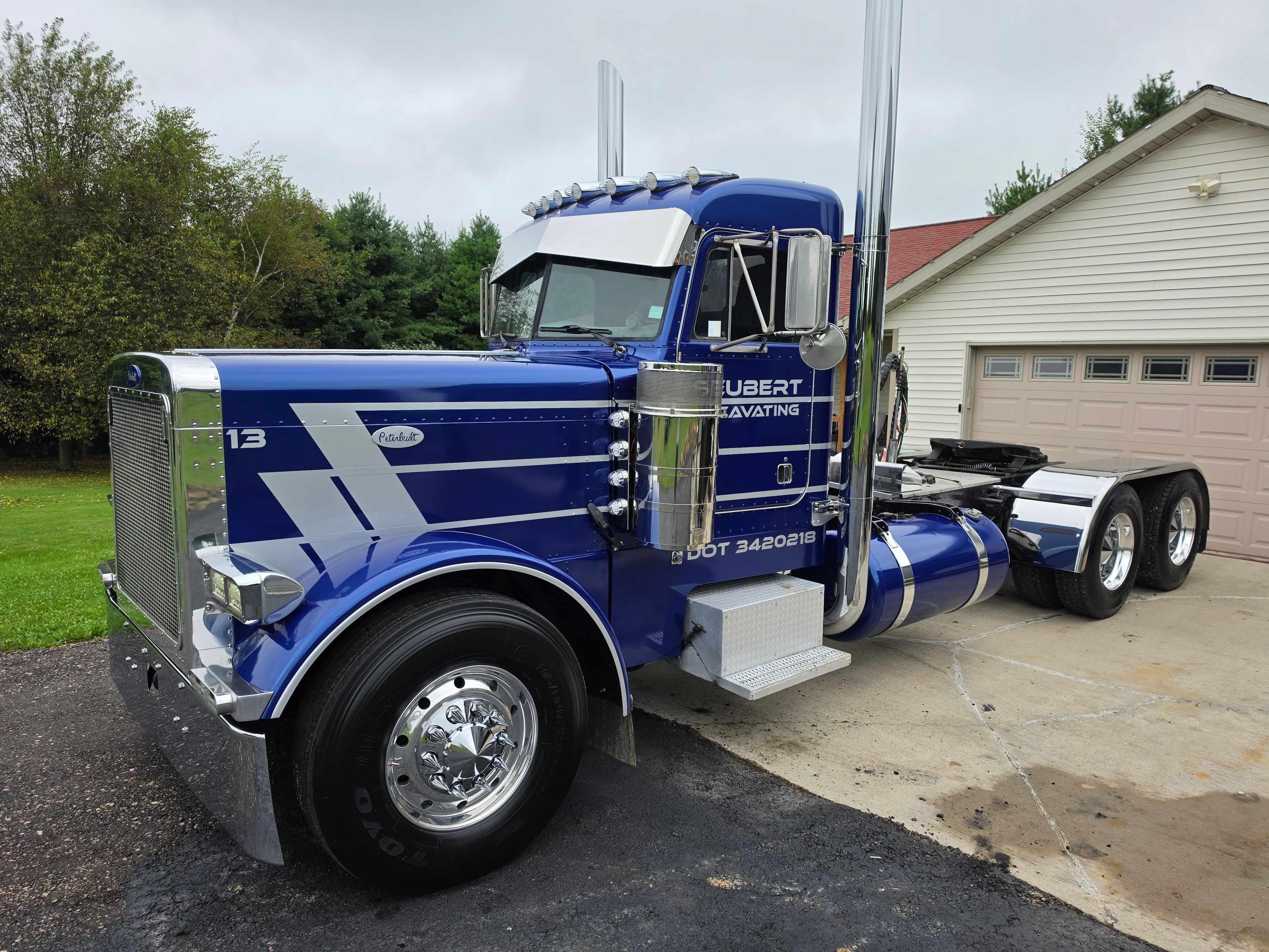 Full custom vinyl wrap on blue Peterbilt semi truck — VR Restoration Marathon WI