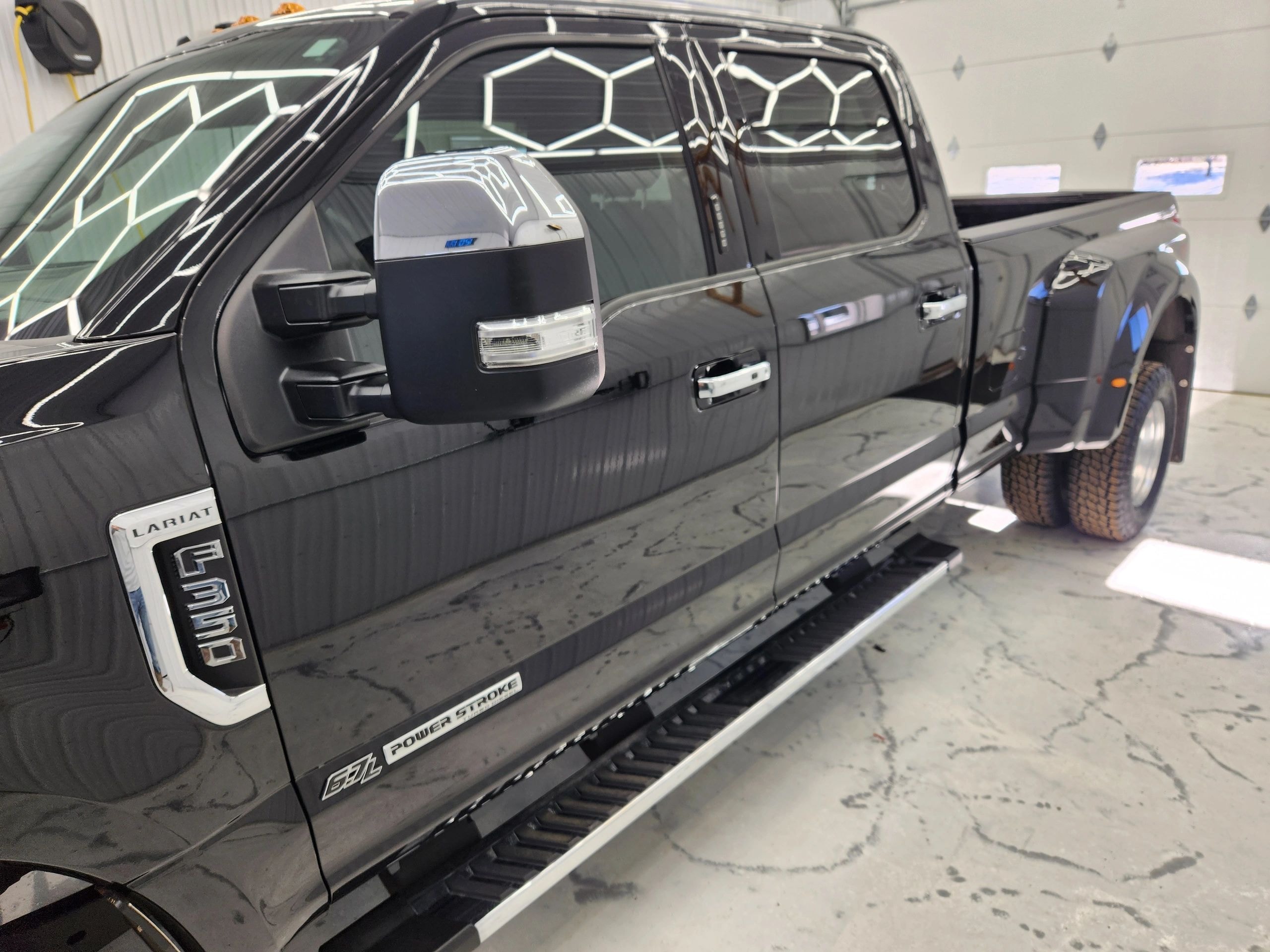 Ceramic Pro coating on black Ford F-Series pickup truck — VR Restoration Marathon WI